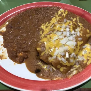 Fajita beef enchiladas and beans 12.23.22