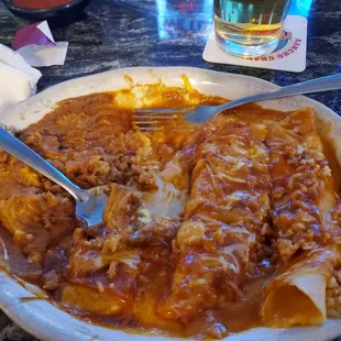 3 cheese enchiladas rice and refried beans awesome!!!!@!!!!