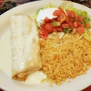 Chicken chimichanga with white cheese sauce. So delicious!