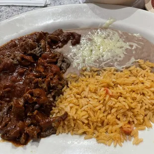 Chile Colorado. Kind of "slop like", just like all the other food I've had here.  Busy as hell feeding the MS masses though.