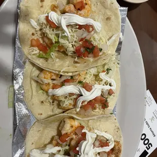 Shrimp tacos. Look pretty but not deveined. Gross.