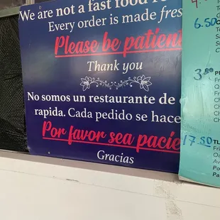 Sign asking for patience. All food is fresh and worth the wait!