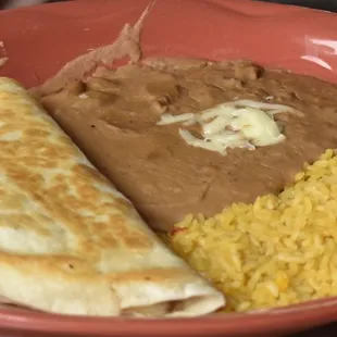 Lunch combination - choose two items with refried beans and rice. There was a taco too.