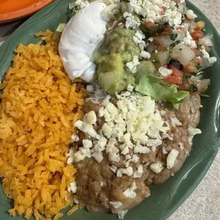 Lunch special FAJITAS TEXANAS $14.95 Steak, chicken and shrimp. Served with rice, beans and mexican salad. Corn or flour tortillas