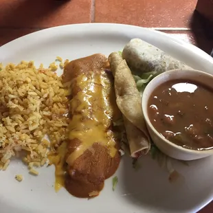 Wednesday lunch special.  Cheese enchilada, chicken flauta, taco al carbon, rice and beans.