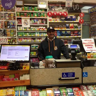 a man behind a cash register