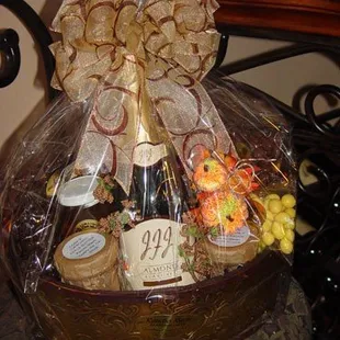 Gift Basket Sample: Gourmet Almonds, Chocolates, Jelly's, Honey and Champagne.