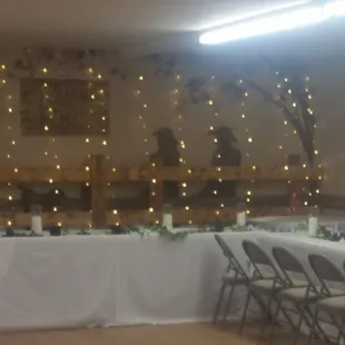 Indoor reception with plenty of seating.