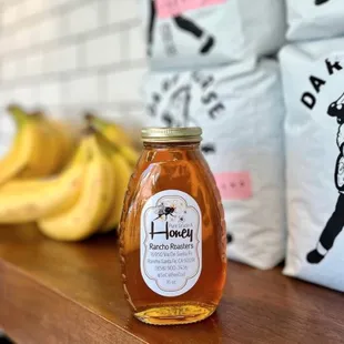 a jar of honey and bananas