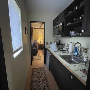 Kitchenette in room 1, connecting to living area