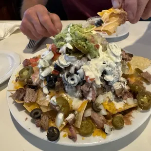We couldn't decide so we shared the tri-tip nachos. Plenty for two.