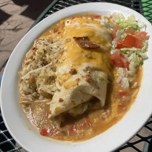 Breakfast burritos with green chili sauce