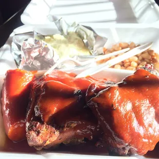 BBQ rib plate, 1/2 pork + half beef slathered with homemade BBQ sauce.