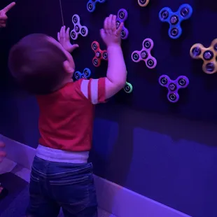 Busy board spinner wall