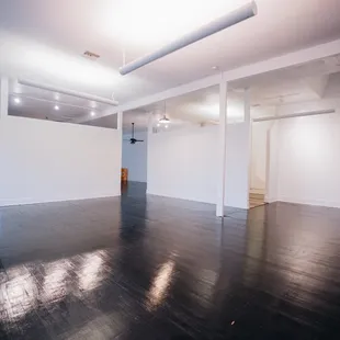 This is the view from the bar area. You can see the den area on your right, bathroom straight down on the left and kitchen behind the wall.