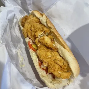 a fried chicken sandwich with french fries