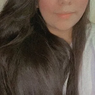 a woman with long brown hair