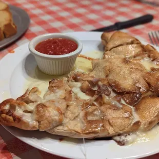 a slice of pizza on a plate