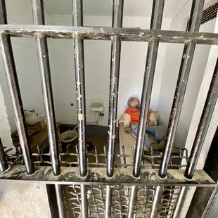 05.27.23 inside there are two small rooms in the back of the jail. Each one has been decorated with mannequins
