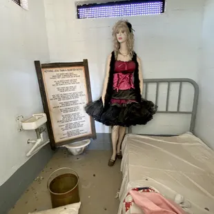 05.27.23 the cell on the left is a Dancehall gal standing next to a poem telling one of her stories