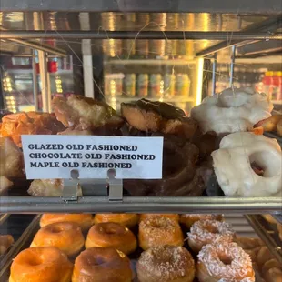 a display of glazed old fashioned donuts