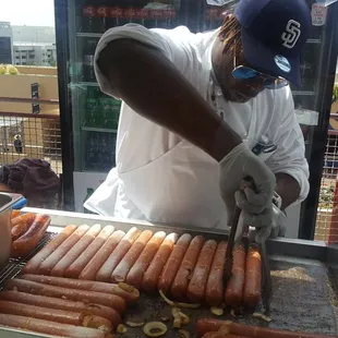 Sidney Bryant Cooking The Slugger Dogs