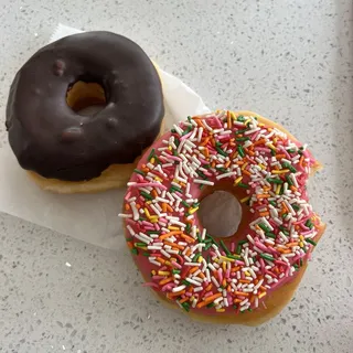 Pink Sprinkles Iced Cake