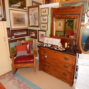 Great oak 1950's Native-American-designed rocking chair, and antique three-drawer oak dresser with mirror