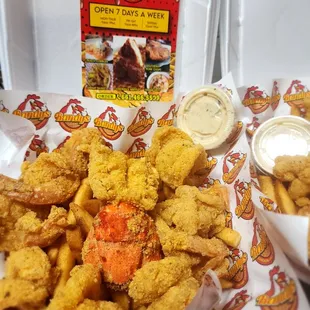 Seafood basket with a side of lobster tail