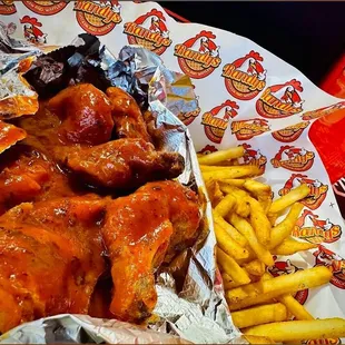 Buffalo wings, seasoned fries and Strawberry lemonade