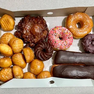 a variety of donuts in a box