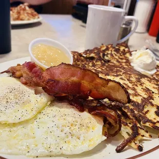 Potato pancakes, eggs and bacon