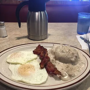 One biscuit and gravy, bacon, over easy eggs. Highly recommend!