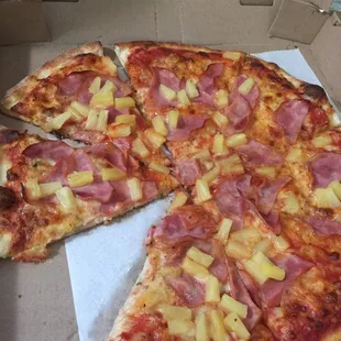 Extra Canadian Bacon and Pineapple pizza. Baked to perfection!