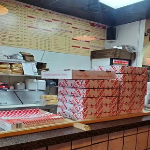 boxes of pizza on a counter