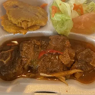 a meal in a styrofoam container