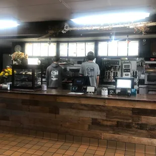 two men working in the kitchen