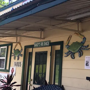 Front door.  Small bar type dining area inside.