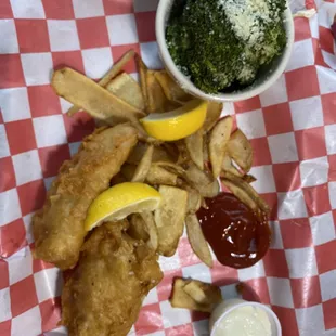 Fish and chips with fries and broccoli