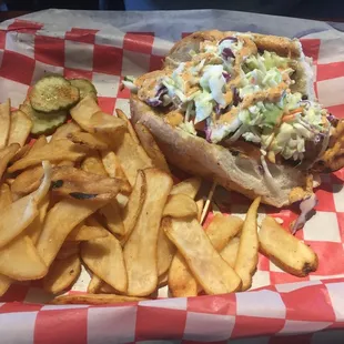 Grilled Shrimp Po&apos;boy topped w/ coleslaw and fries!