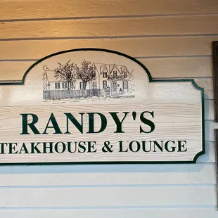 a sign for randy&apos;s steakhouse and lounge