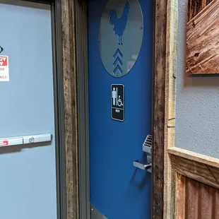a blue door with a sticker on it