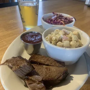 Delicious Eats Tender Brisket, Mac Salad and Purple Coleslaw. Check out their local beers on Tap.