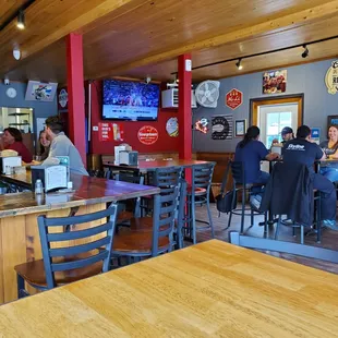 Interior: bar, tables, and TV