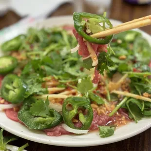 07. BO TAI CHANH ((Thin sliced Raw Beef) Favorite!!!