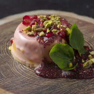 a dessert on a wooden plate
