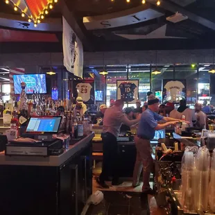 patrons at the bar