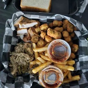 Pulled pork, chicken, fries, and fried okra.