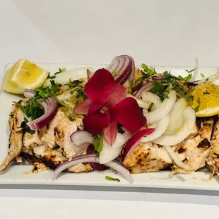 Tandoori chicken and comes with red and green sauce