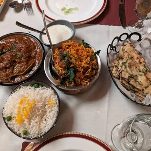 Lamb vindaloo, gobi biryani, chili garlic naan